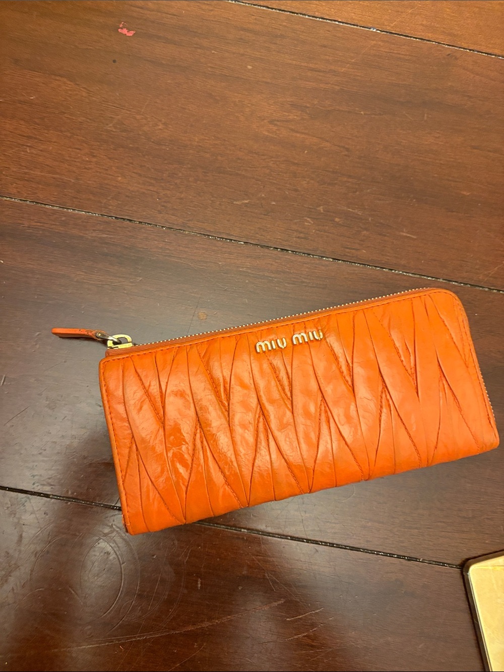 Miu Miu Orange Ruched Leather Zip Wallet In excellent condition